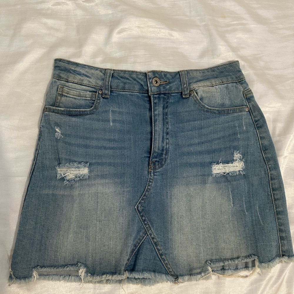 Stretch short skirt, light blue jean with small rips